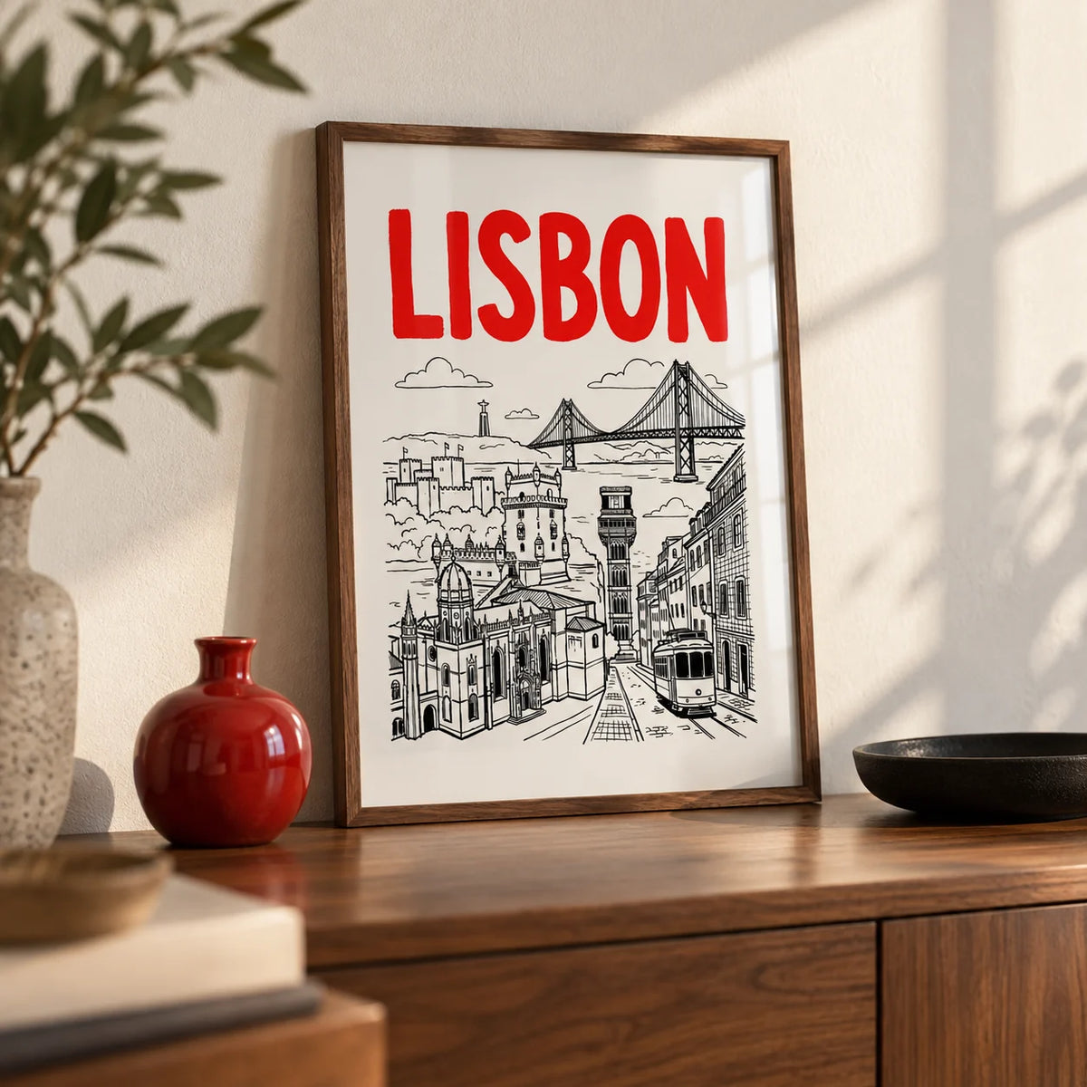 Lisbon Travel Art, a small A4 framed print leaning on a walnut sideboard in a living room
