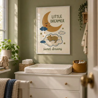 Little Dreamer Wall Art, framed on the wall of a compact nursery changing alcove in a British flat with muted olive green walls