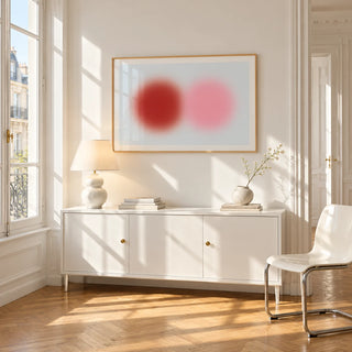 Red and Pink Circles Print, framed on the wall of a bright Paris style apartment