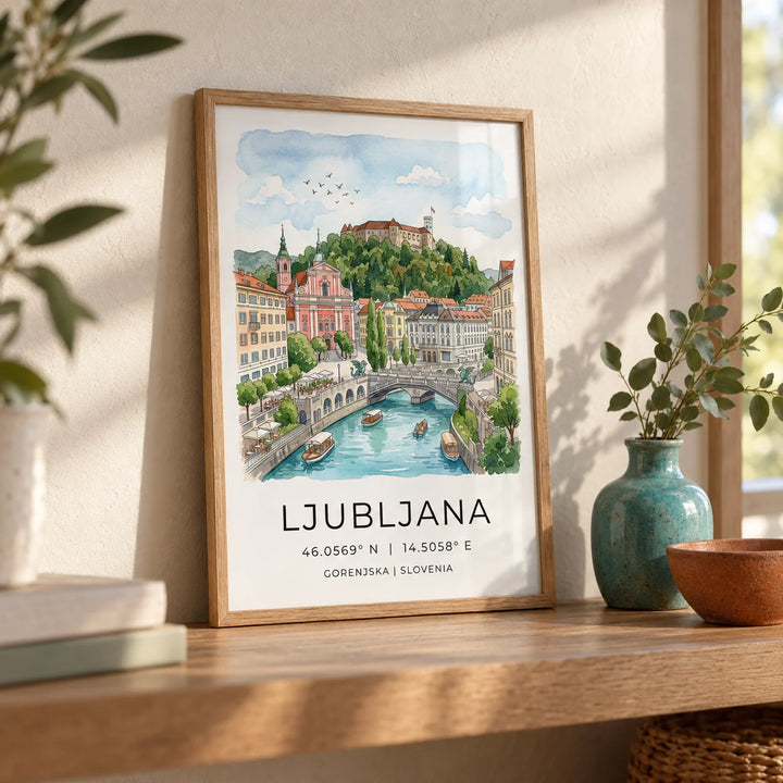 Ljubljana Art Print, a small A4 framed print leaning on an oak shelf in a living room