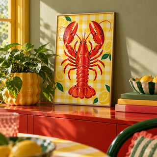 Lobster and Lemons Print, a small A4 framed print leaning on a colourful lacquered shelf in a living room