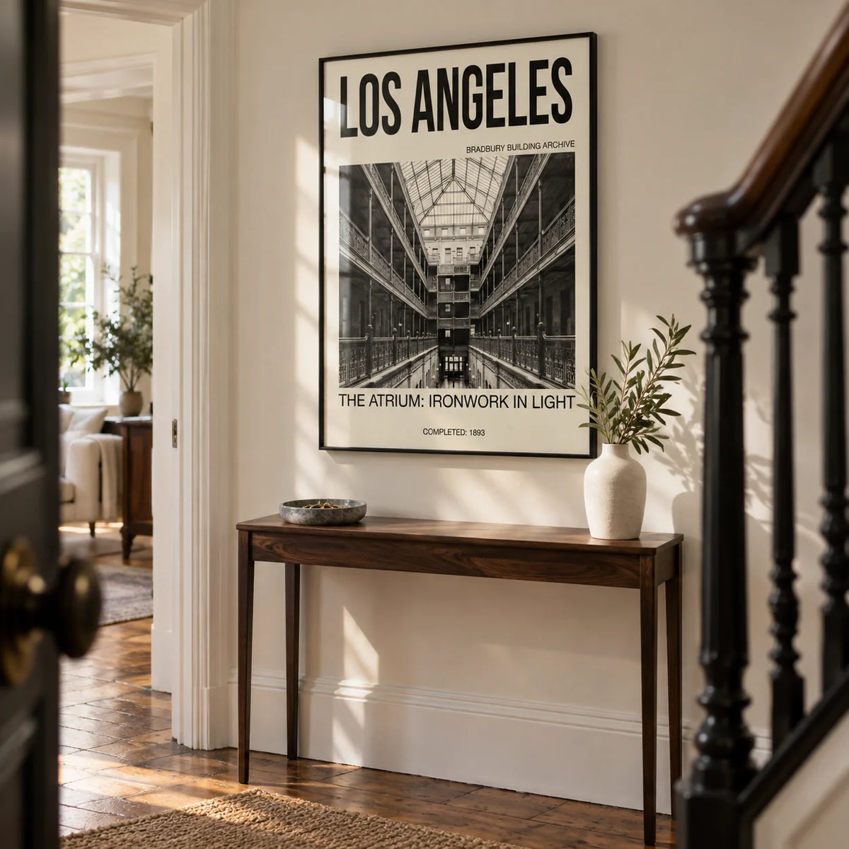 Los Angeles Architecture Art Print, framed on the wall of a characterful hallway in a renovated Victorian terrace with ivory walls