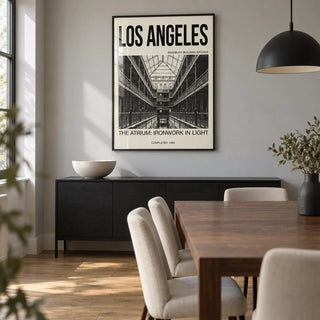 Los Angeles Architecture Art Print, framed on the wall of a compact modern dining room in a UK apartment with a pale grey wall and oak flooring