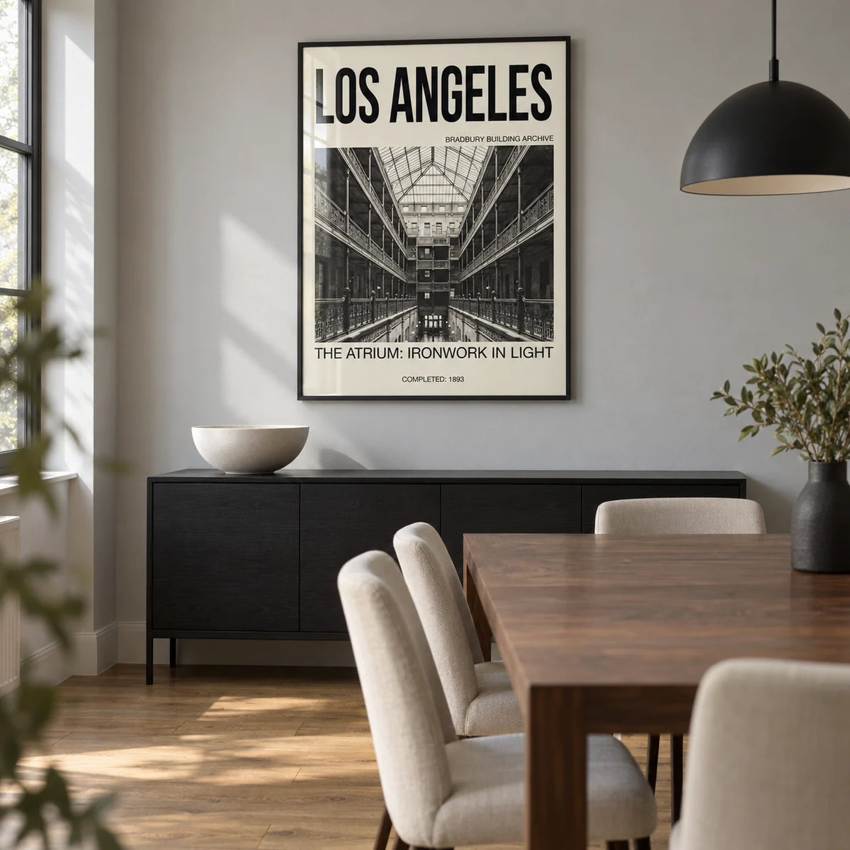 Los Angeles Architecture Art Print, framed on the wall of a compact modern dining room in a UK apartment with a pale grey wall and oak flooring