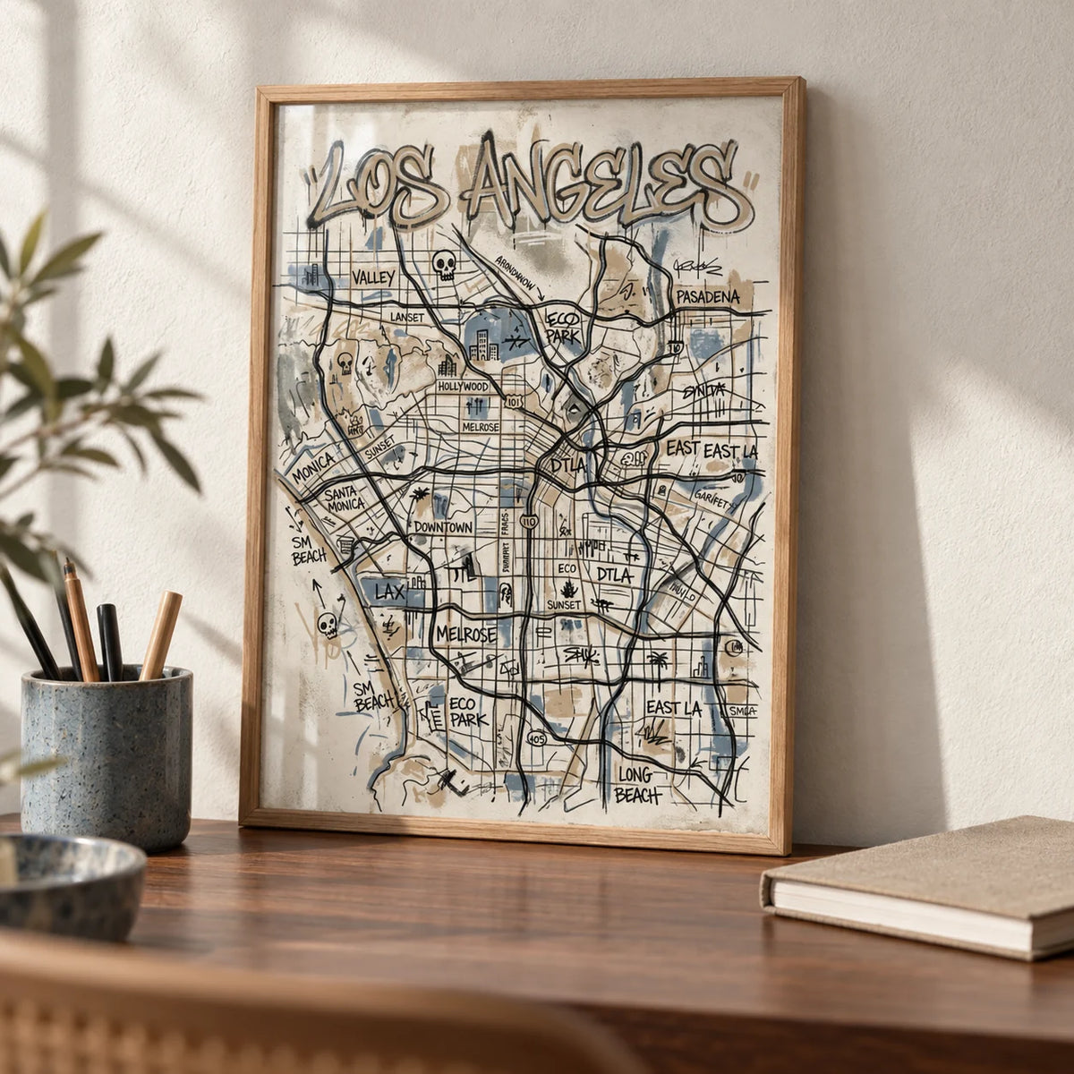 Los Angeles Map Art, a small A4 framed print leaning on a walnut desk