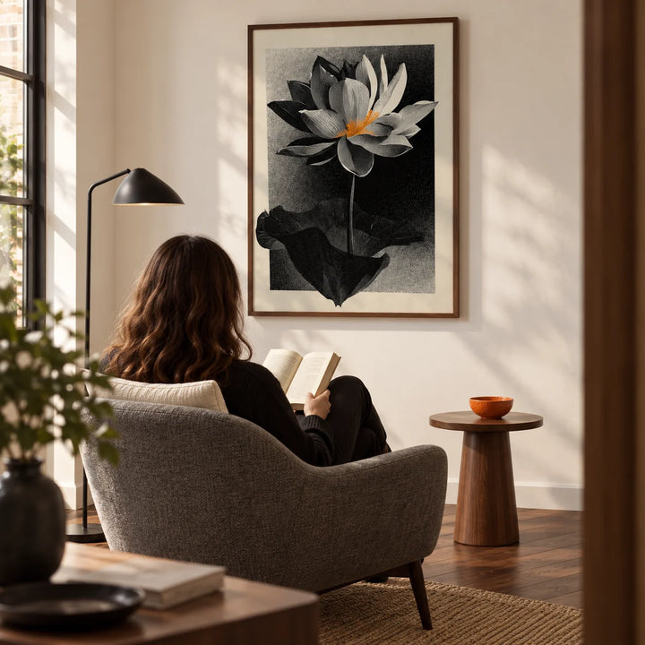 Lotus Flower Art Print, framed on the wall of a quiet reading corner in a design-led UK home with a warm white wall and walnut floorboards in a living room