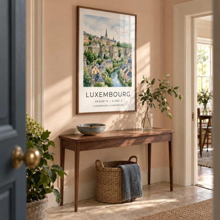 Luxembourg City Wall Art, framed on the wall of a welcoming hallway in a UK period flat with pale peach walls and limestone floor tiles