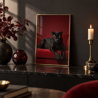 Luxury Panther Art, a small A4 framed print leaning on a black marble side table in a hallway