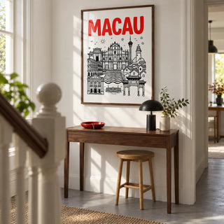 Macau Travel Art, framed on the wall of a bright hallway in a renovated UK terrace with chalk-white walls and a plain grey floor