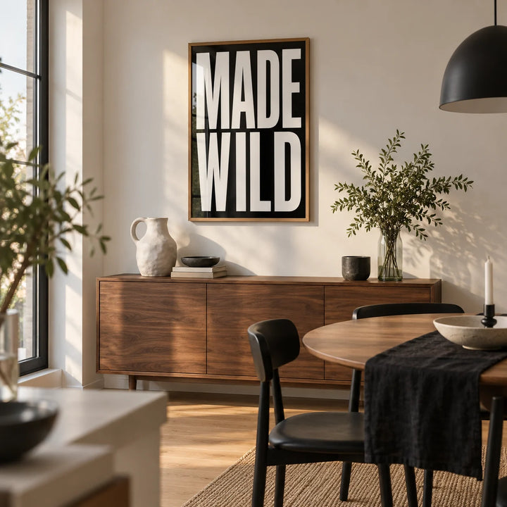 Made Wild Art Print, framed on the wall of a modern dining corner in a first flat for a creative couple (25-35)
