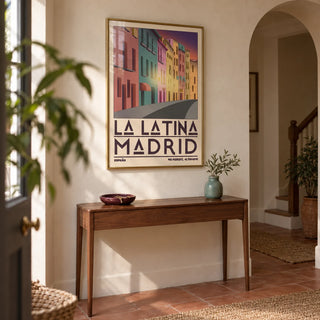 Madrid City Wall Art, framed on the wall of a welcoming hallway in a renovated UK terrace with pale warm plaster and terracotta floor tiles without pattern