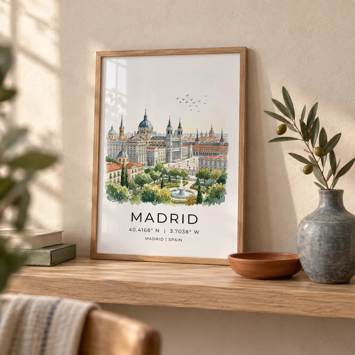 Madrid Cityscape Art Print, a small A4 framed print leaning on a pale oak shelf in a living room