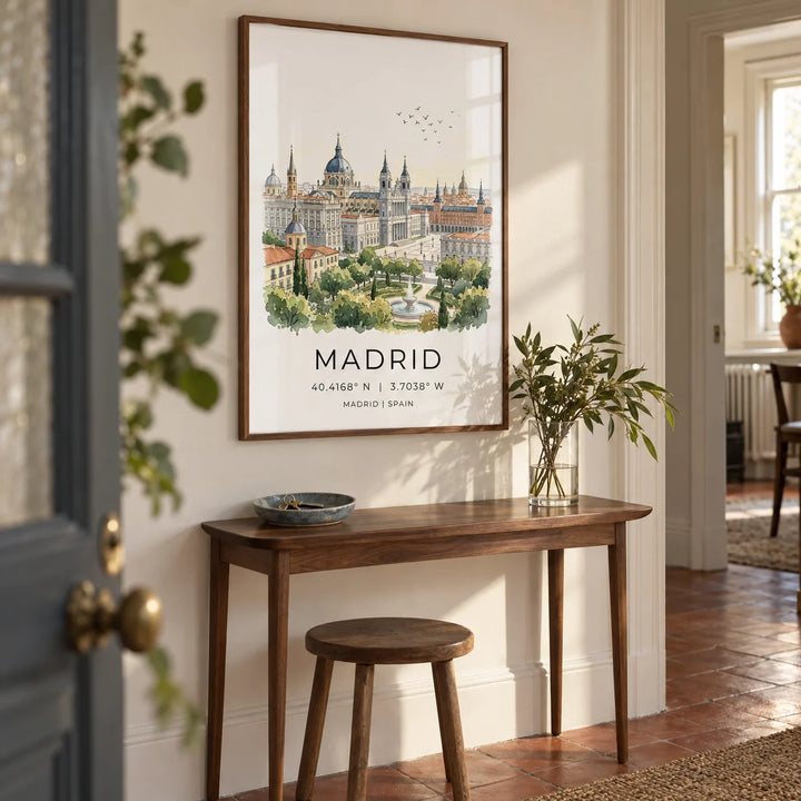 Madrid Cityscape Art Print, framed on the wall of a welcoming hallway in a UK period flat with warm white walls and plain terracotta floor tiles