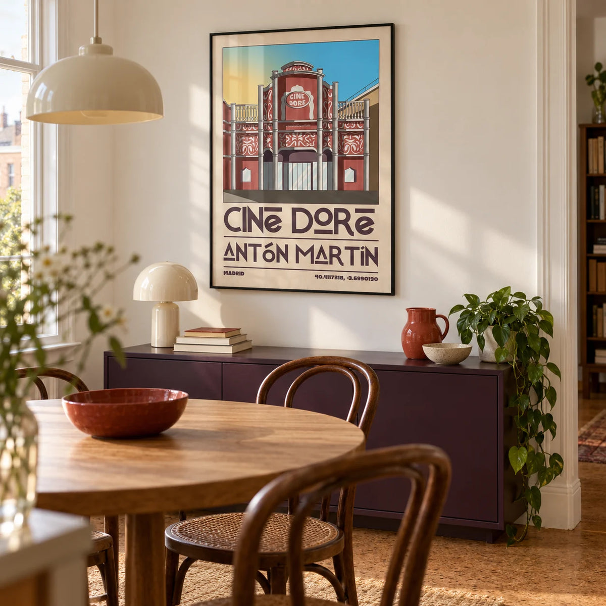 Madrid Landmark Poster, framed on the wall of a characterful dining room in a UK city flat with warm white walls and a cork floor