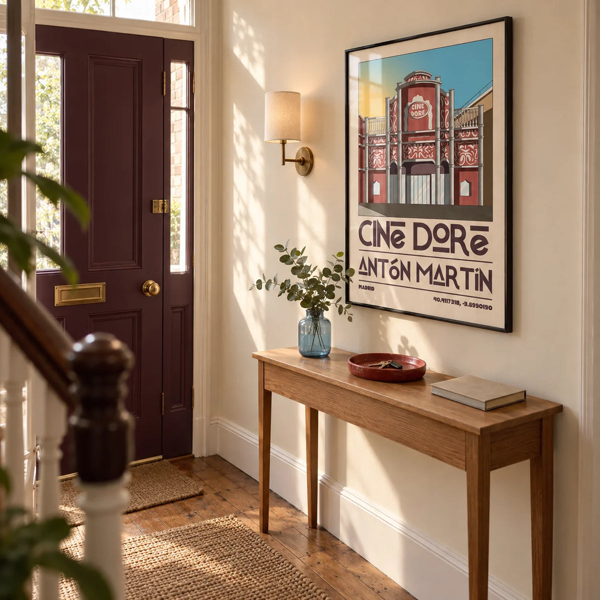 Madrid Landmark Poster, framed on the wall of a welcoming narrow hallway in a UK terraced house with warm cream walls