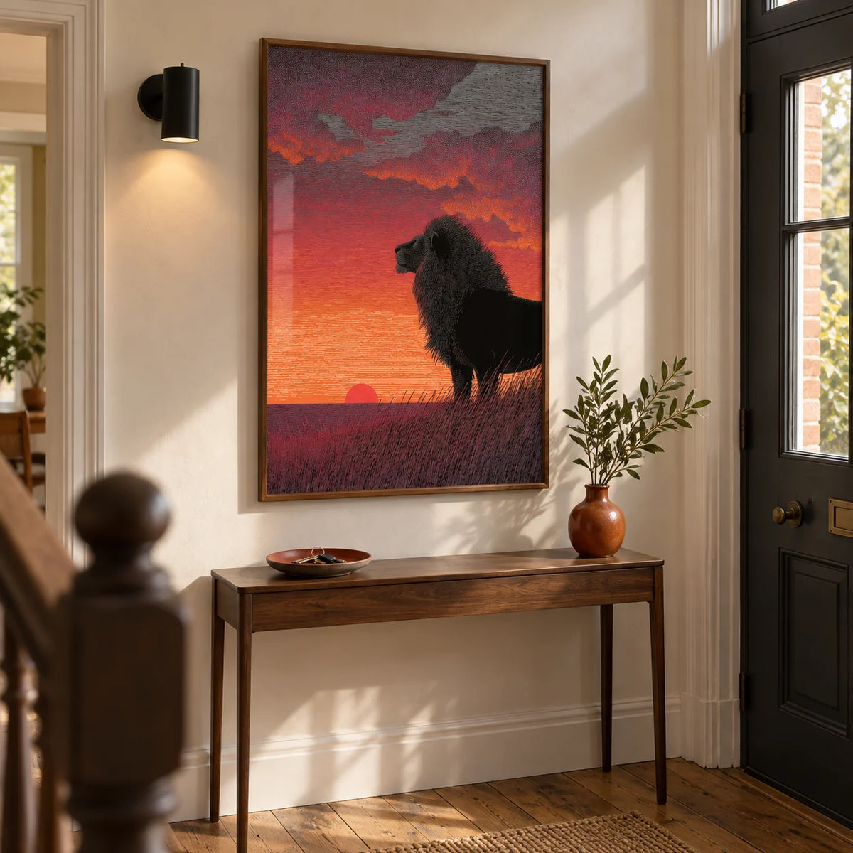 Majestic Lion Art Print, framed on the wall of a welcoming hallway in a renovated UK terrace with warm white plaster walls and a charcoal painted front door