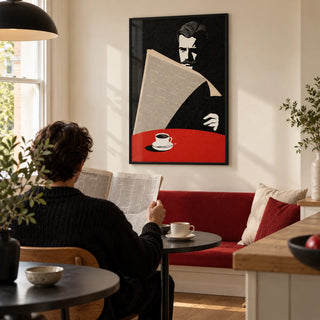 Art Deco Newspaper Reader Print, framed on the wall of a bright breakfast nook in a UK flat with a cream wall and a built-in bench upholstered in plain deep red fabric in a kitchen