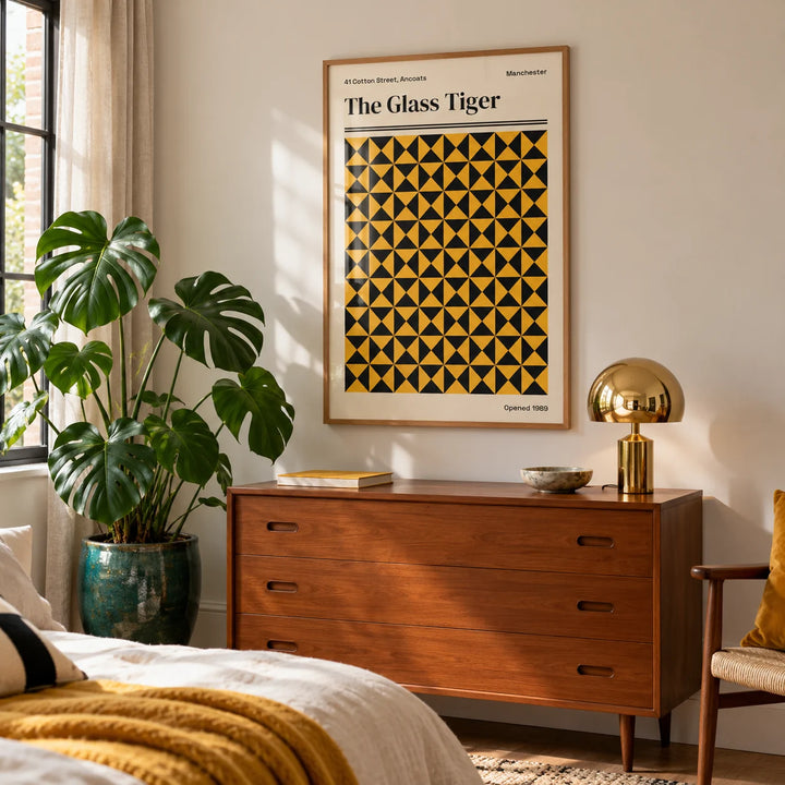 Manchester Art Print, framed on the wall of a bright bedroom corner with a pale wall