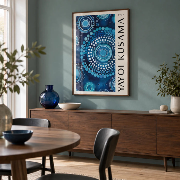 Mandala Wall Art, framed on the wall of a modern dining room in a UK flat with a muted teal wall and pale timber flooring