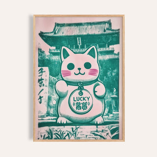 Framed print of a minimalist green and pink maneki-neko cat figurine with a temple background