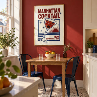 Manhattan Cocktail Art Print, framed on the wall of a bright eat-in kitchen in a UK maisonette with a deep red painted wall beside a tall window