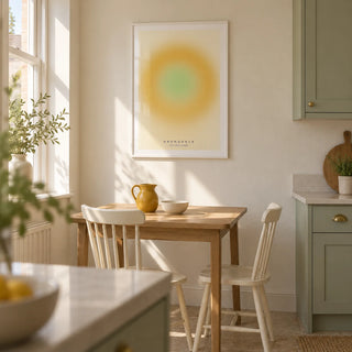 Manifestation Wall Art, framed on the wall of a bright compact kitchen in a UK terrace with pale green cabinets and a warm white wall