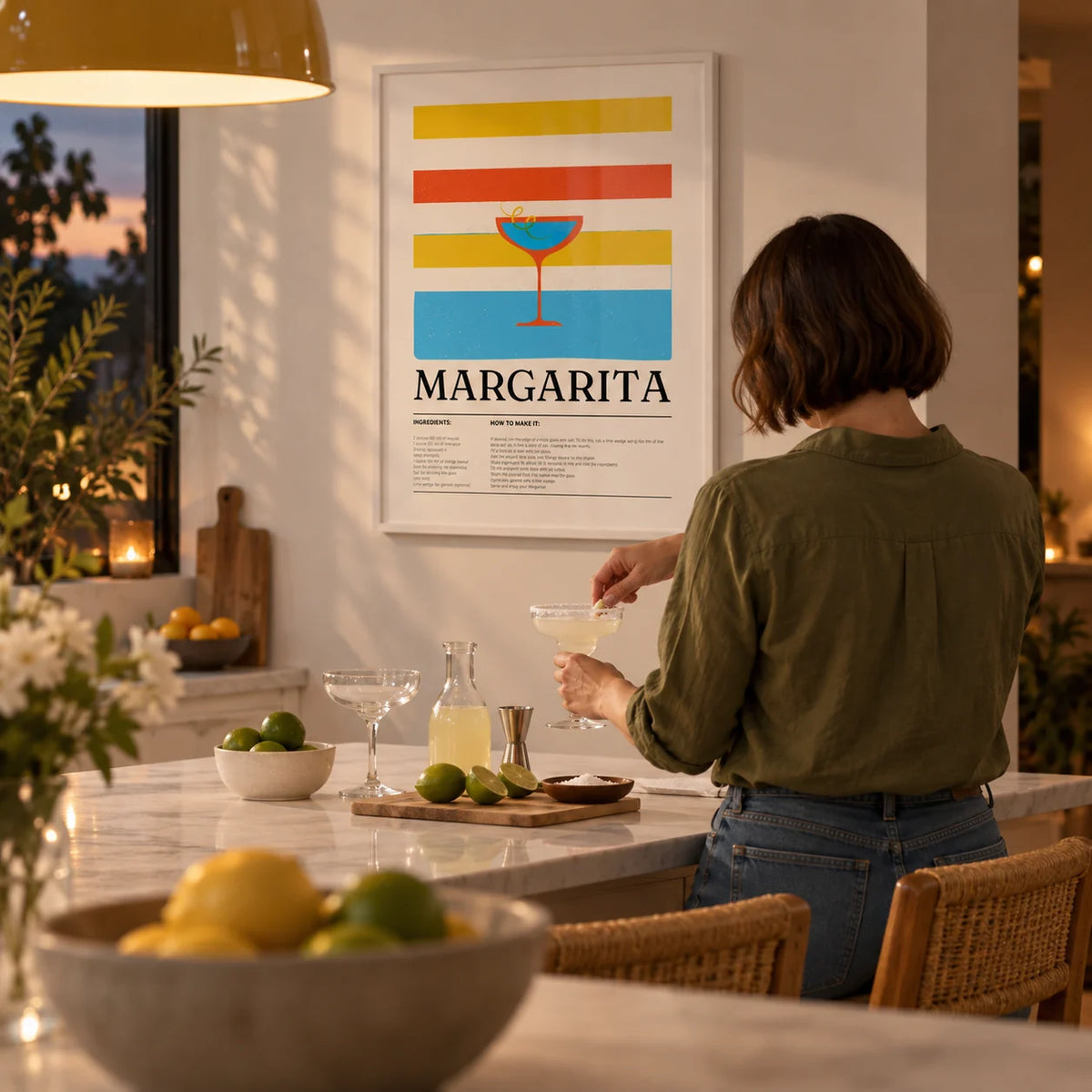 Margarita Wall Art, framed on the wall of a bright kitchen with a white island