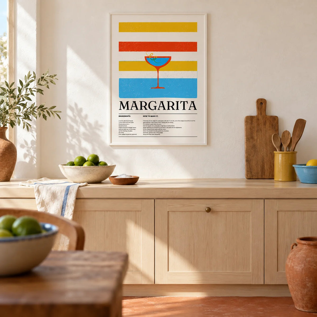 Margarita Wall Art, framed on the wall of a warm Mexican-modern kitchen with a white limewashed wall and a plain terracotta floor