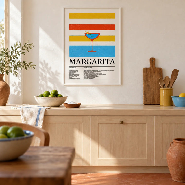 Margarita Wall Art, framed on the wall of a warm Mexican-modern kitchen with a white limewashed wall and a plain terracotta floor