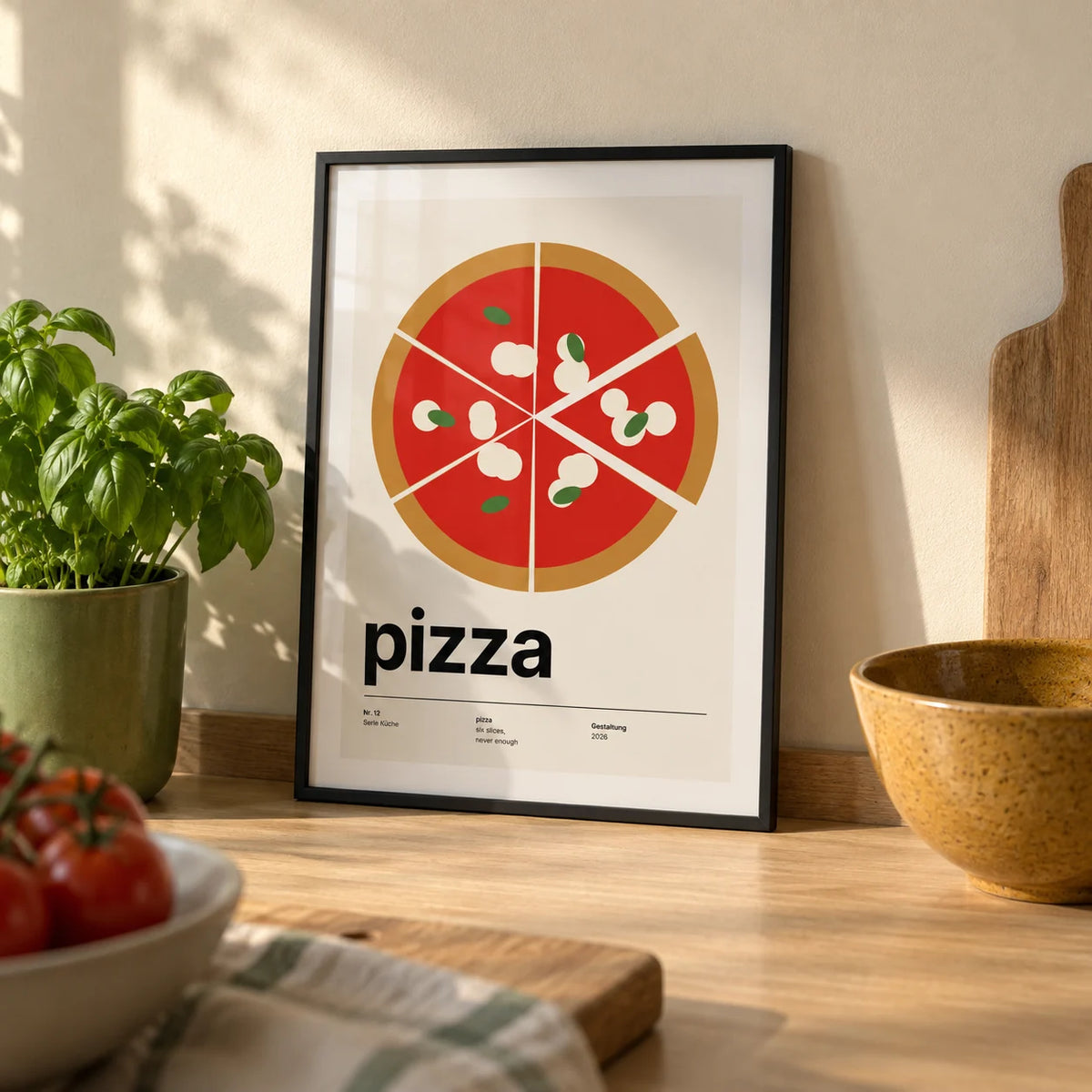 Margherita Pizza Print, a small A4 framed print leaning on a pale oak kitchen worktop