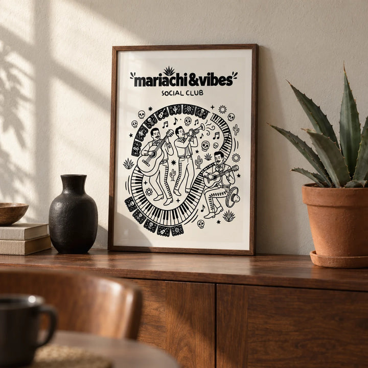 Mariachi Art Print, a small A4 framed print leaning on a walnut side table in a hallway
