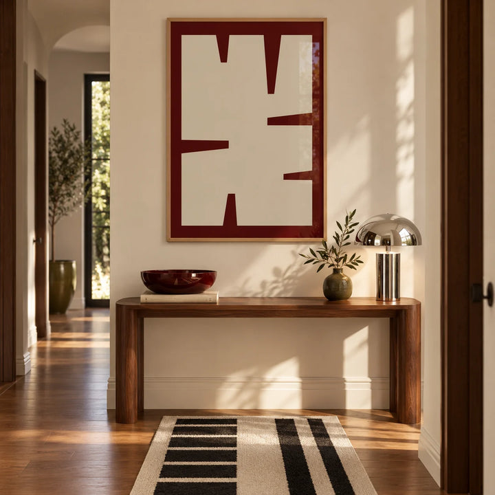 Maroon Wall Art, framed on the wall of a bright mid-century hallway