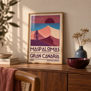 Maspalomas Vintage Wall Art, a small A4 framed print leaning on a walnut sideboard in a living room