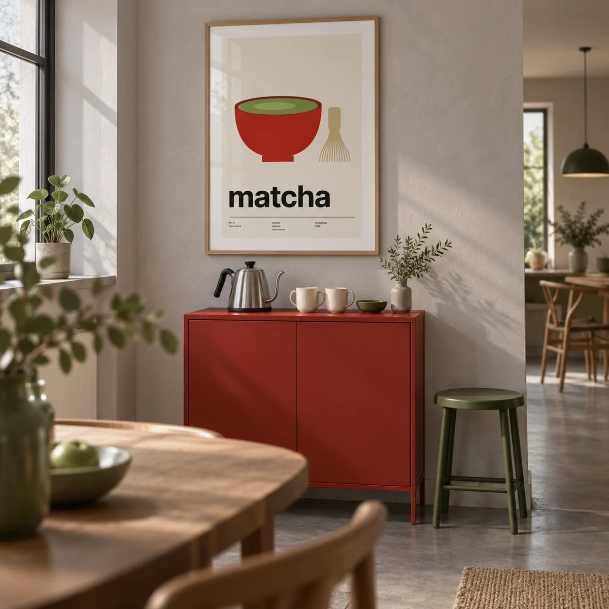 Matcha Poster, framed on the wall of a dedicated tea corner in an open-plan UK kitchen-diner with a pale grey plaster wall and a smooth concrete floor