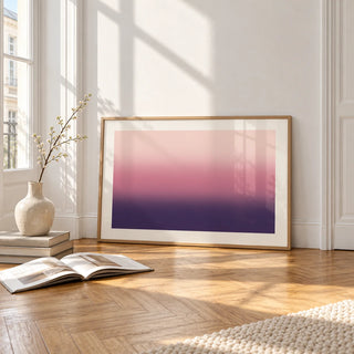 Mauve Print, framed and leaning on the parquet floor of a bright living room