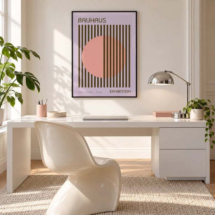 MCM Wall Art, framed on the wall of a bright white home office with a chrome lamp