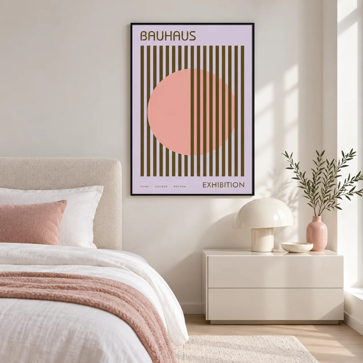 MCM Wall Art, framed on the wall of a calm white bedroom with blush pink bedding
