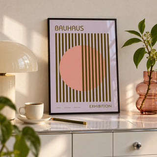 MCM Wall Art, a small A4 framed print leaning on a white sideboard in a living room