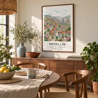 Medellin City Art Print, framed on the wall of a relaxed dining room in a travel-loving couple's UK home with warm off-white plaster walls