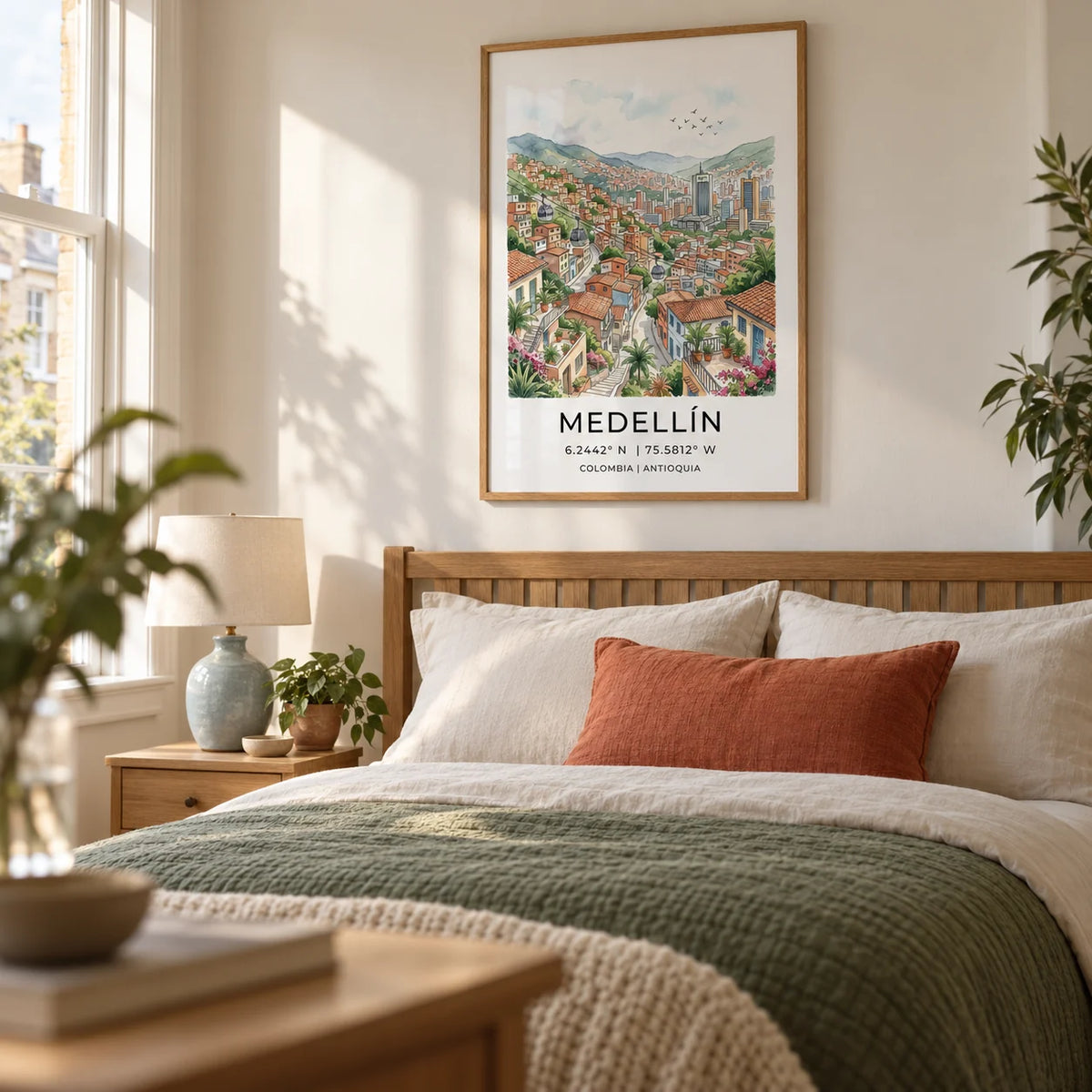 Medellin City Art Print, framed on the wall of a restful bedroom in a UK townhouse with warm white walls and an oak double bed