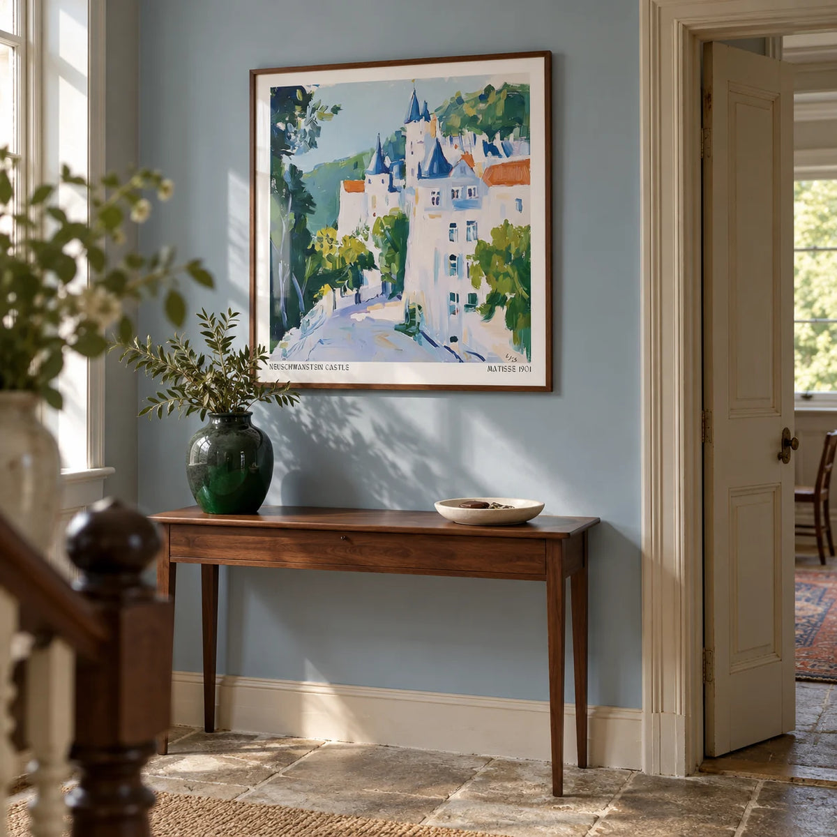 Medieval Castle Art, framed on the wall of a characterful entrance hall in a UK period home with pale blue walls and a stone floor
