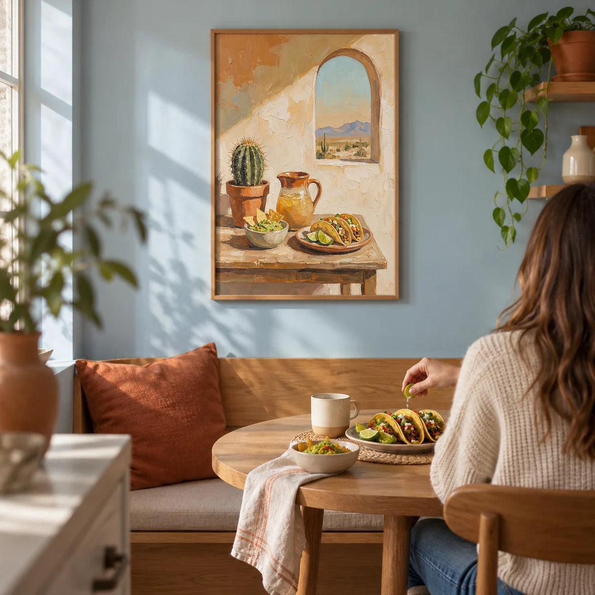 Mexican Food Art, framed on the wall of a compact breakfast nook in a UK first flat for a couple aged 25-35 in a kitchen