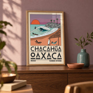 Mexico Beach Art Print, a small A4 framed print leaning on a walnut side table in a hallway