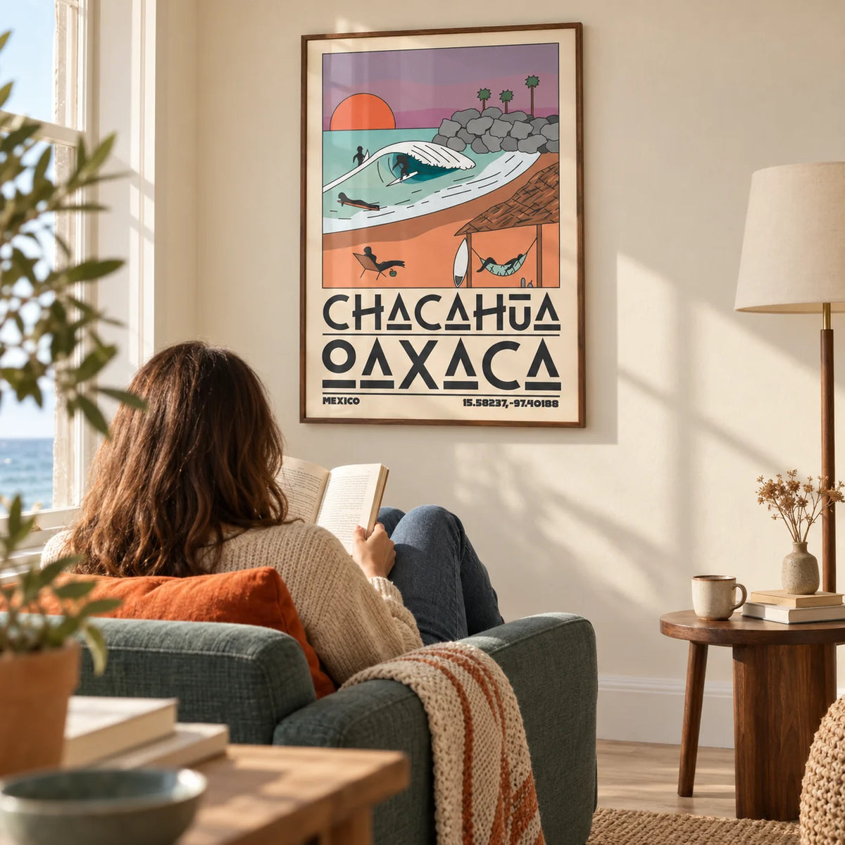 Mexico Beach Art Print, framed on the wall of a sunlit reading corner in a UK coastal flat with a warm cream wall and a pale wood floor in a living room