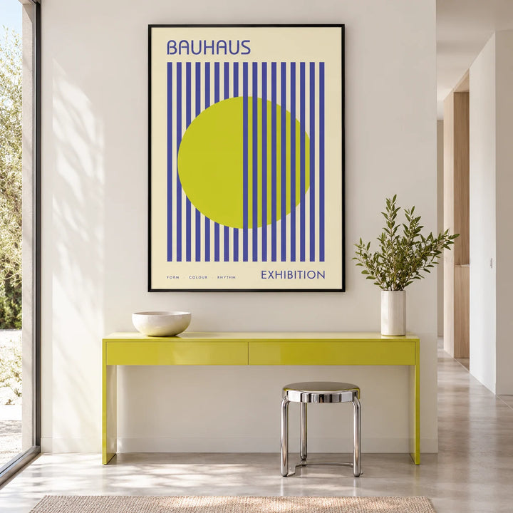 Mid Century Modern Art, framed on the wall of a bright hallway with a lime side table