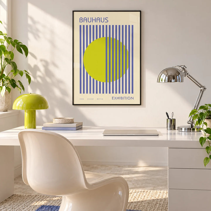 Mid Century Modern Art, framed on the wall of a bright white home office with a lime lamp
