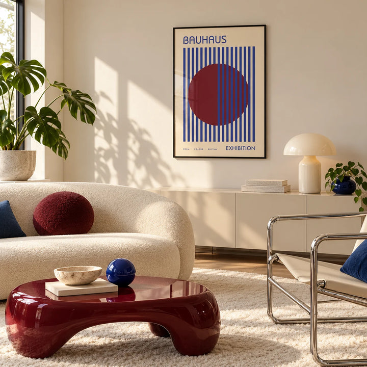 Mid Century Wall Art, framed on the wall of a bright living room with a cream boucle sofa and a burgundy coffee table