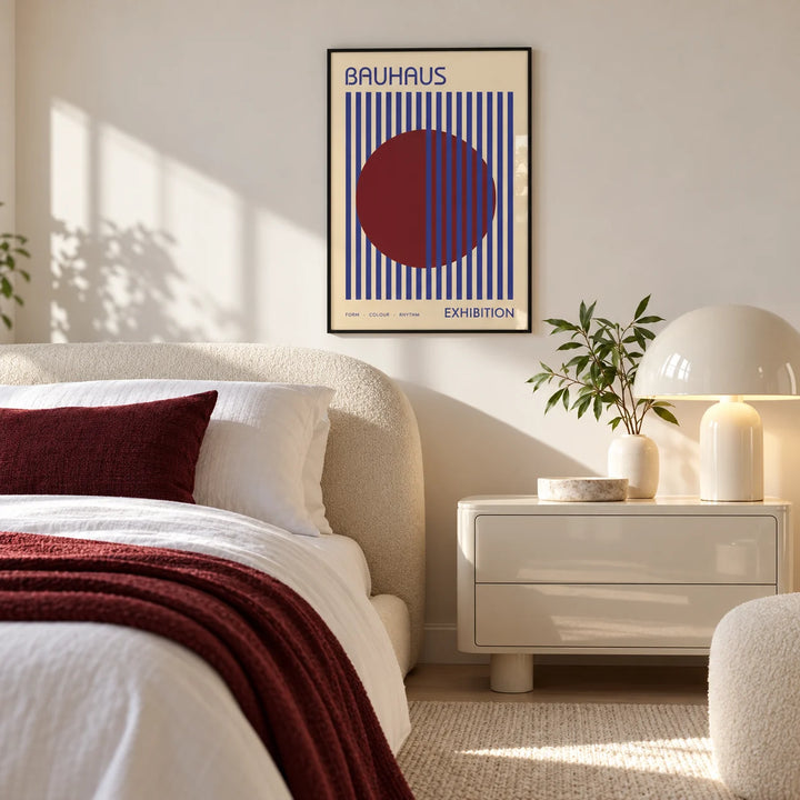 Mid Century Wall Art, framed on the wall of a calm white bedroom with a burgundy throw