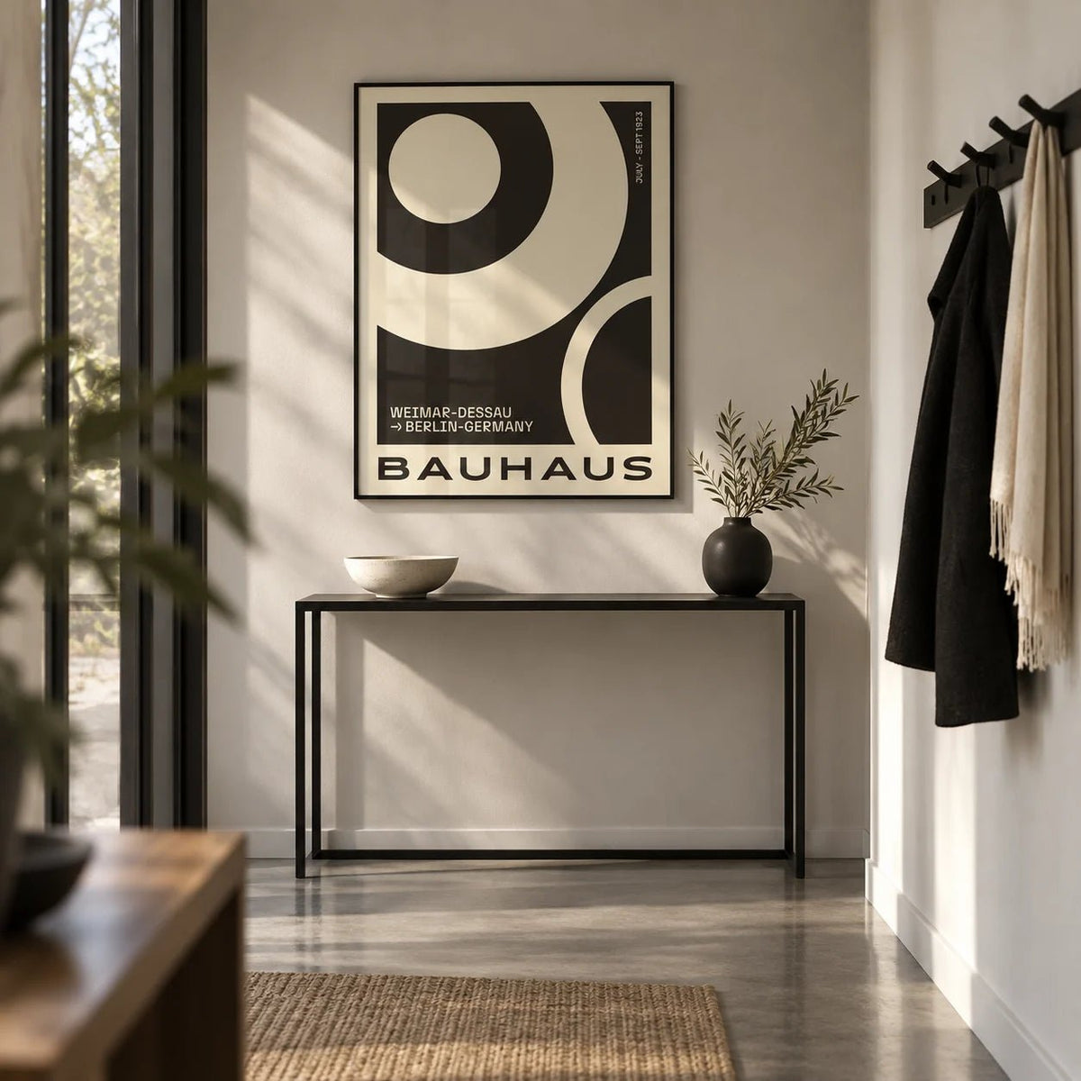 Minimalist Abstract Art Prints, framed on the wall of a minimal hallway with a polished concrete floor
