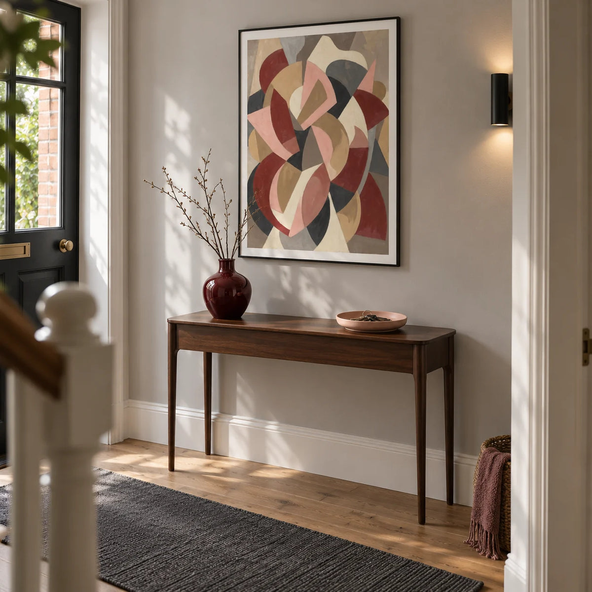 Minimalist Abstract Wall Art, framed on the wall of a welcoming hallway in a renovated UK terrace with pale grey walls and oak floorboards
